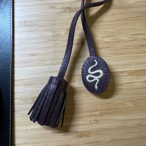 Fossil Burgundy Leather Tassel Keychain with snake